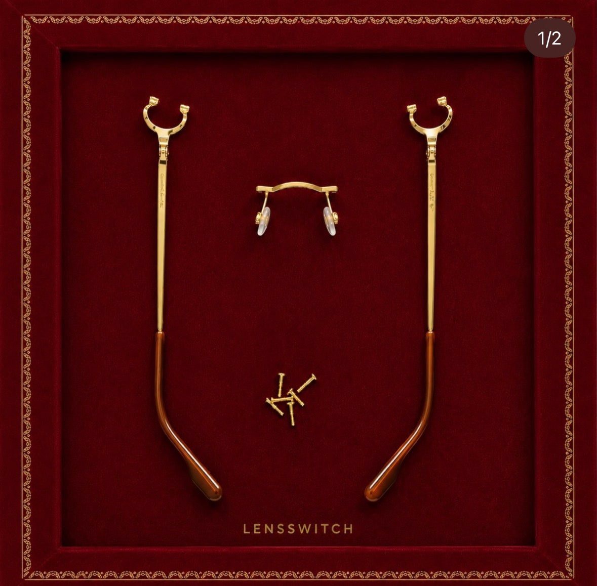 Gold rimless frame components arranged on a burgundy Lensswitch tray